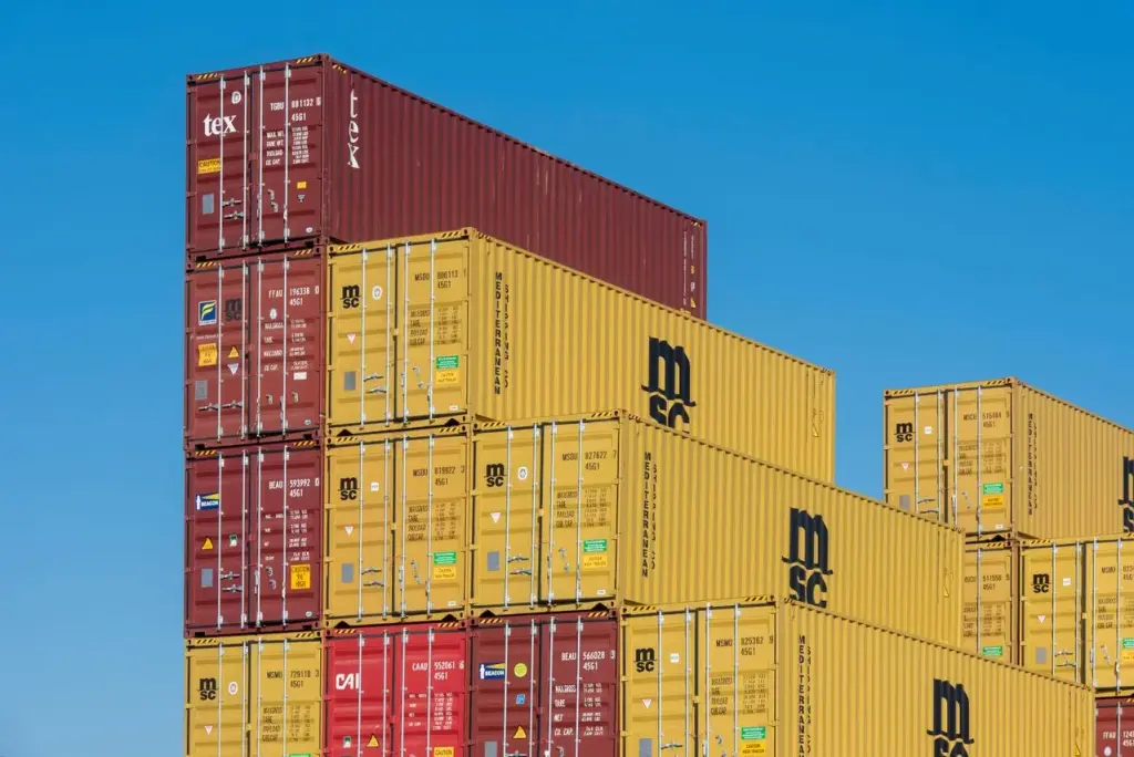 Stacked shipping containers at a port